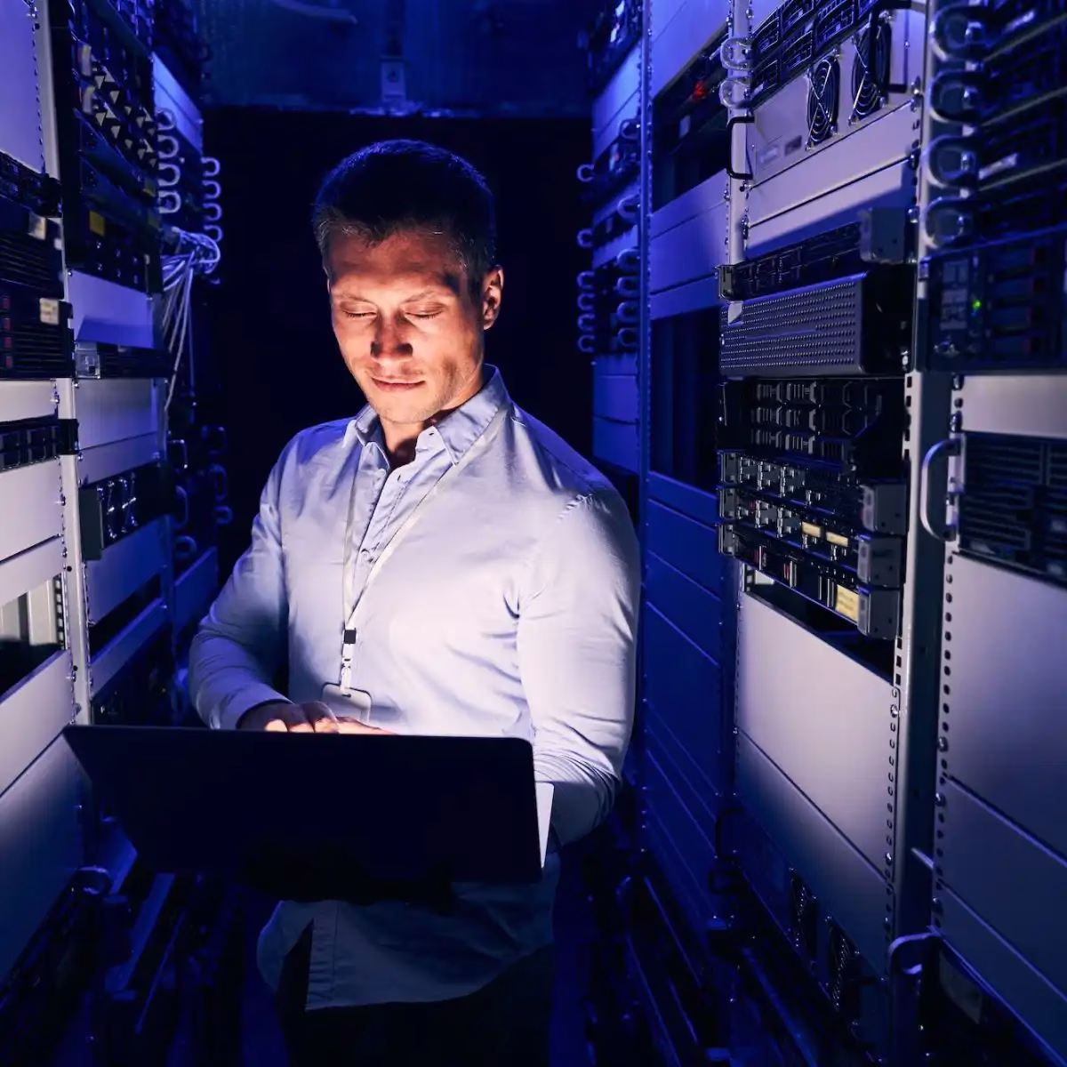 data-center-it-worker-staring-at-his-notebook-computer-pye4193ta0pl54e02piu15n8p7ju2o8jk9h8aoojxc
